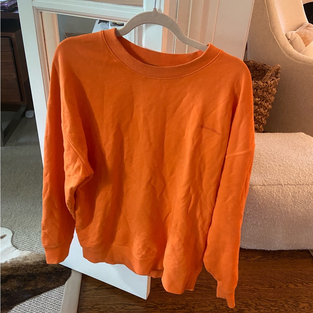 Outdoor Voices orange crew neck in size medium!